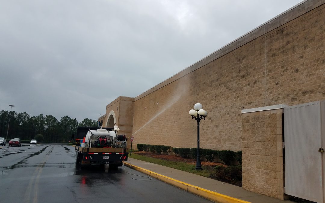 Pressure washing commercial building